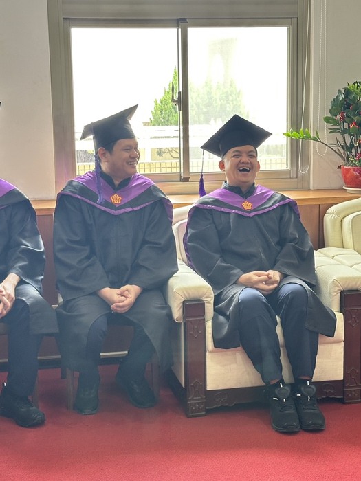 The Class of 2026 International Graduates and Faculty
